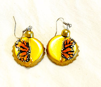Aretes corcholata monarca dorada