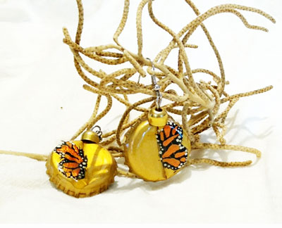 Aretes corcholata monarca dorada